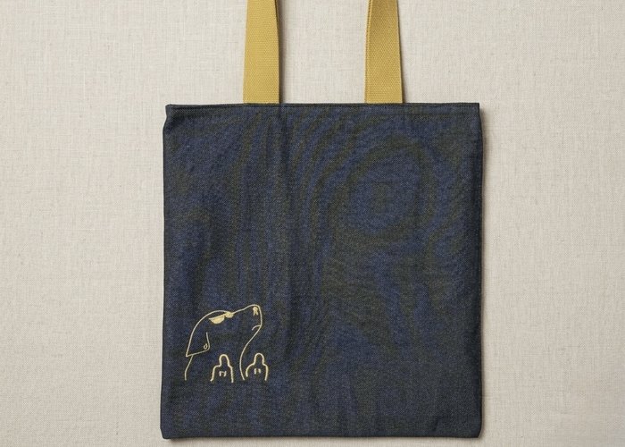 Front exterior of the reversible Dog Trace Tote bag.